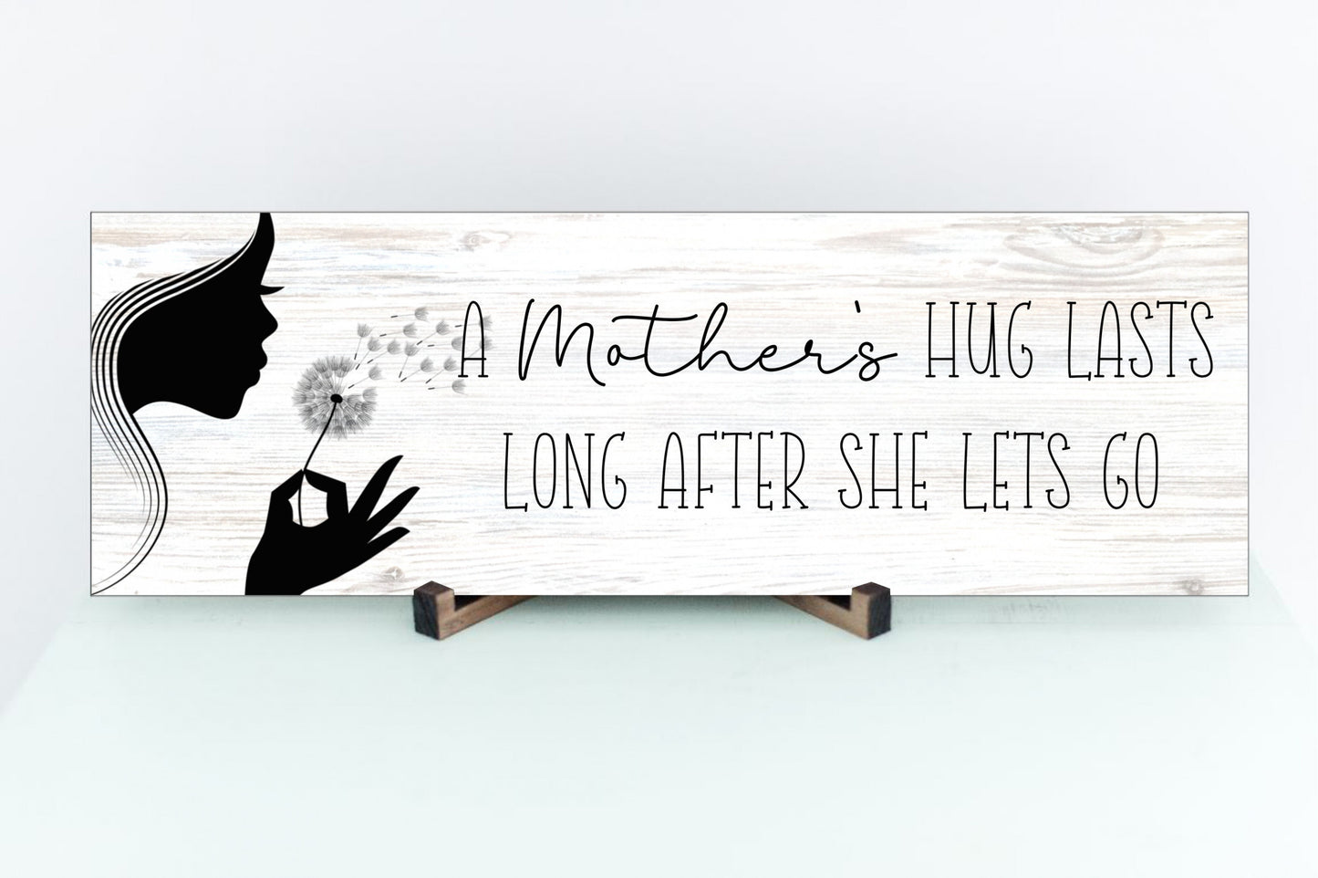 A Mother's Hug Lasts Long After She Lets Go Sign